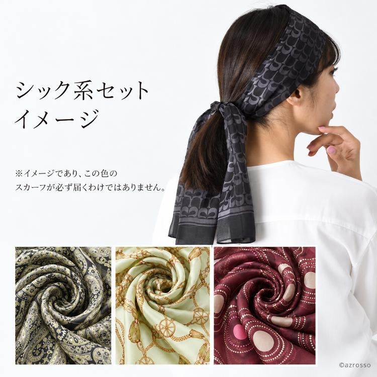 黒とグレーの柄スカーフを髪に結んだヘアアレンジ。シック系セットの使用イメージ